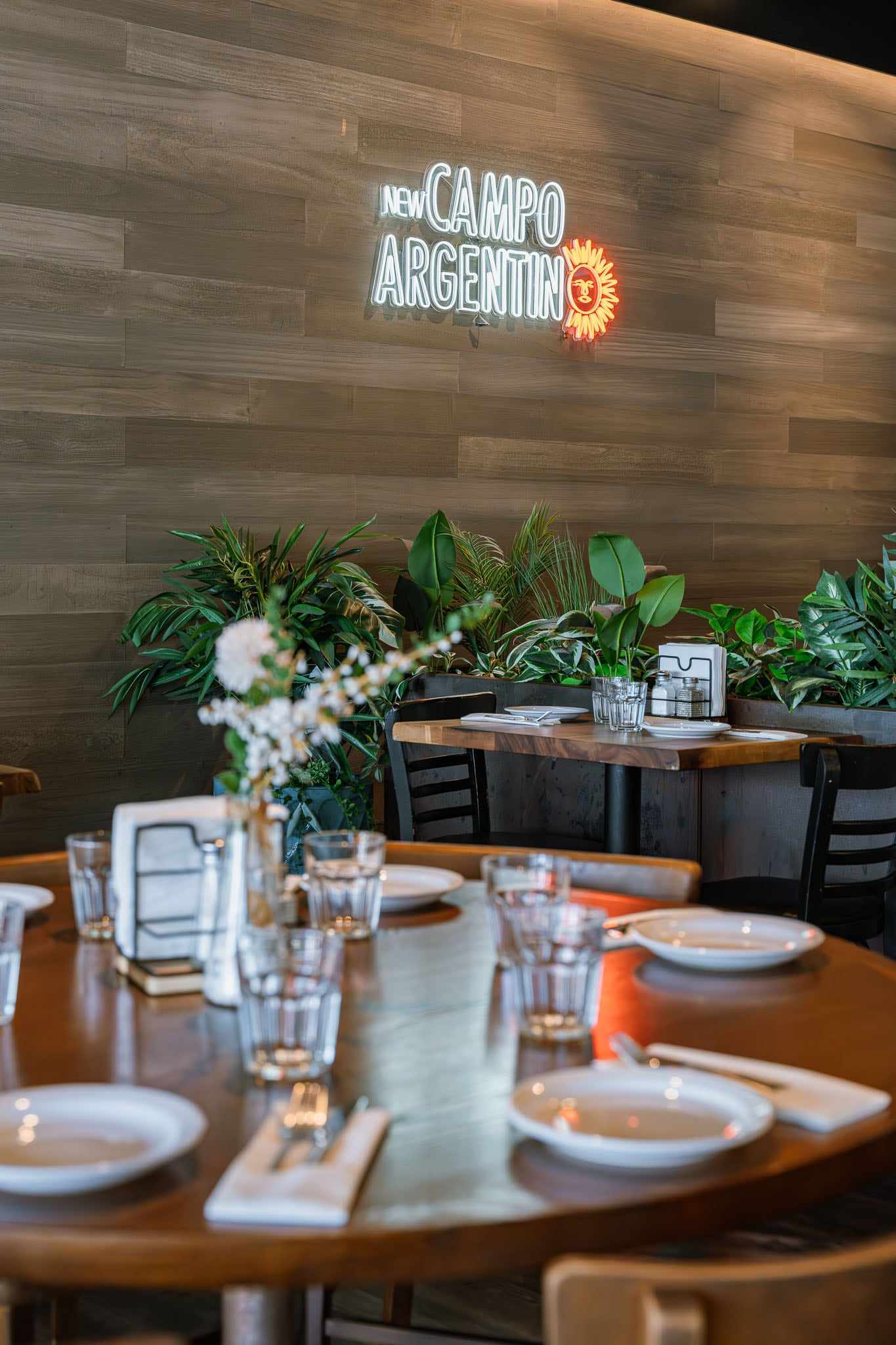 One open dining room with TVs and a sound system at New Campo Argentino Steakhouse