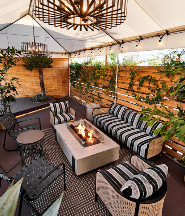 Tiered garden patio with fireplace lounge seating at Golden Bull Restaurant