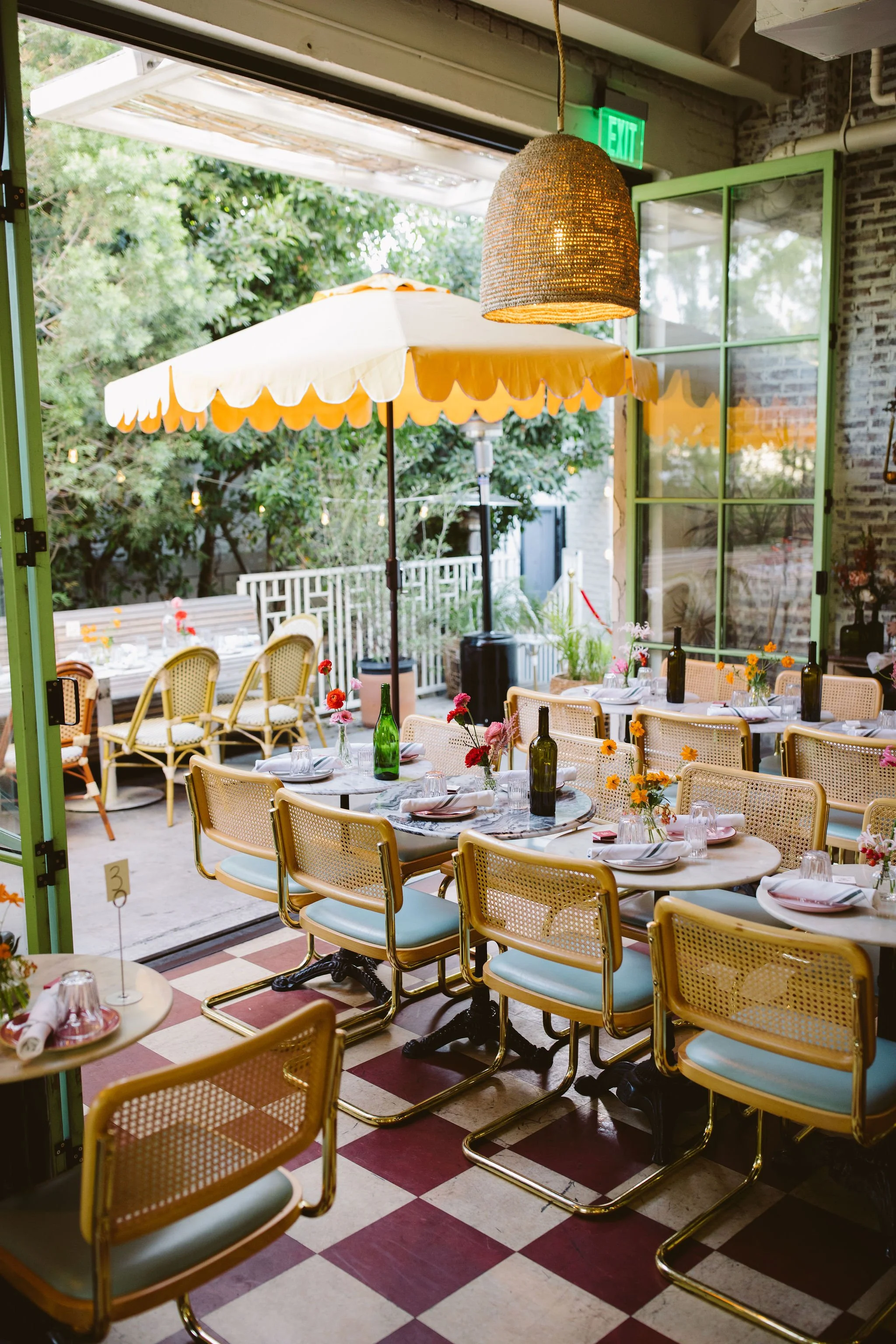 Open Dining room w/ side patio, lower patio and garden bar area at De La Nonna - Art's District