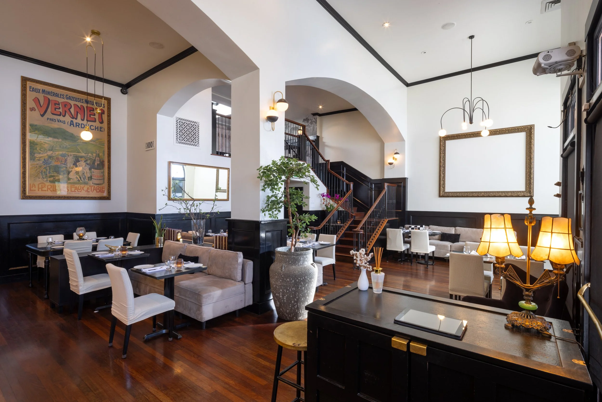 Half of the Main Dining Room at The Black Sheep Restaurant + Bar