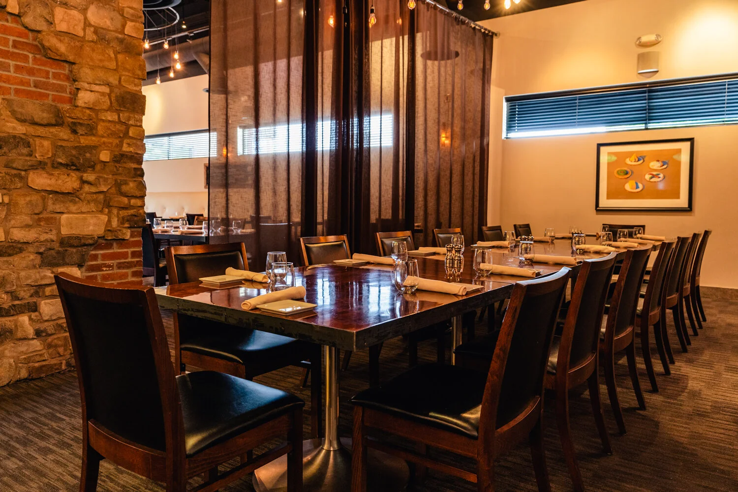 Semi-private dining area adjacent to the wood fire oven at Bistro 7
