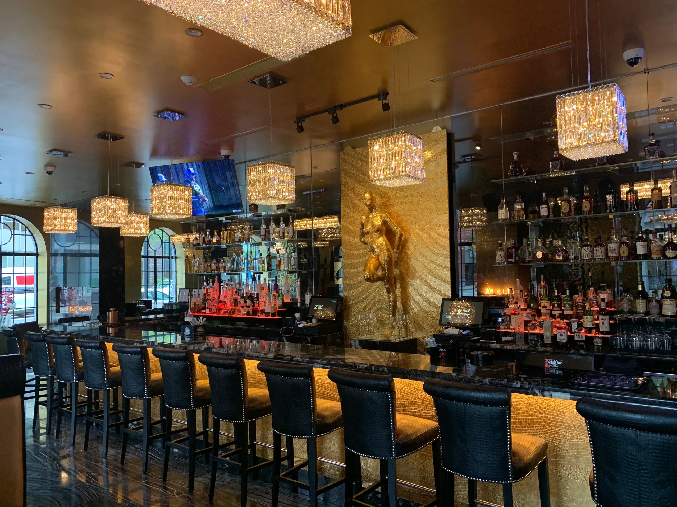 Glass-enclosed private dining lounge at Z Prime Italian Steakhouse